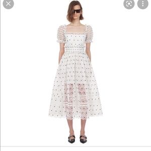 Brand new. Never worn. Short hibiscus guipure dress